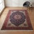 This stunning Persian Heriz/Serapi rug features a classic geometric medallion design, showcasing intricate motifs and a...