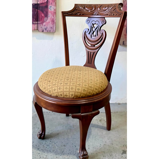 Elegant antique Chippendale-style carved mahogany side chair distinguished by an exceptionally beautiful pierced and...