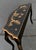 This is a mod-century Italian black and gilt chinoiserie console table. It has a lovely pastoral chinoiserie top, and it...