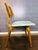 This is a classic 1950s bentwood chair is in the style of Bruno Weil for Thonet. The chair has an ergonomically-shaped...