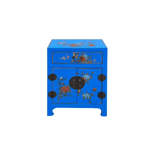 Step into a world of vibrant tradition with this stunning Chinese-style accent cabinet. Finished in a rich paint bright...