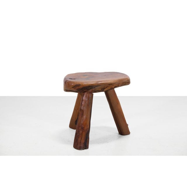 This beautiful, handcrafted stool is made of exquisite olive wood and dates back to the 1950s. It was purchased in France....
