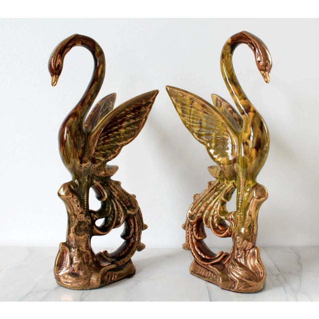 Beautiful pair of decorative glazed ceramic majestic birds. No makers mark. Minor wear. No chips.
