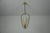 This elegant ceiling lamp from 1960s germany showcases a refined combination of brass and opal glass. The opal glass...
