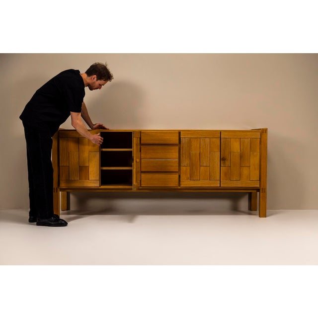 A solid and sculptural sideboard that evokes the spirit of 1980s Brutalism. Designed with clarity and intention, this...