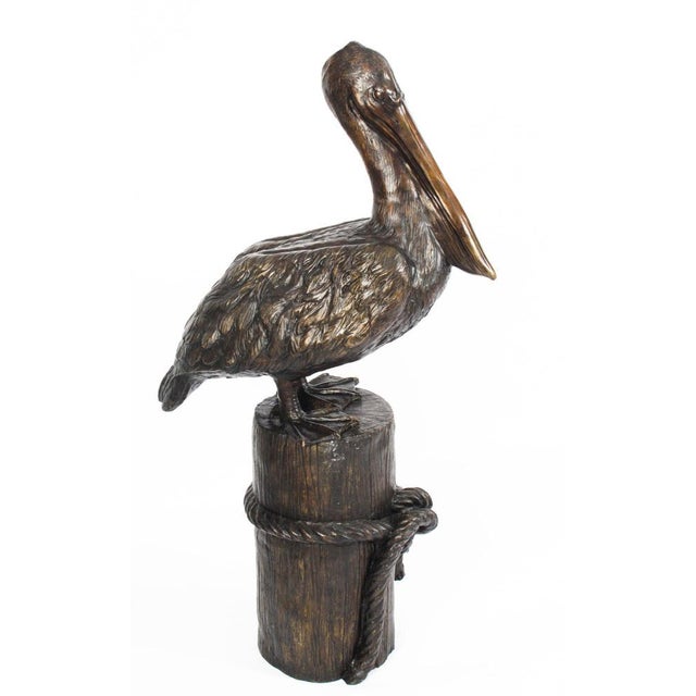 This is a splendid large pair of solid bronze pelicans on mooring posts, dating from the late 20th century. This charming...