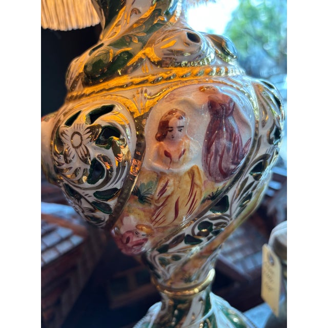 Italian Hand-Painted Capodimonte Porcelain Lamp depicting images of women and floral motifs throughout. great condition,...