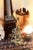 A wooden corner shelf with 2 shelves with scroll cut edges and cutouts. Folk or rustic style handmade in the 1920s-30s....