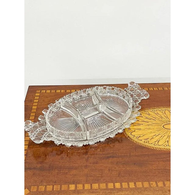 19th century Russian crystal cut set wit castellated rims A dividing tray with 4 compartments and 2 dishes on a saucer....