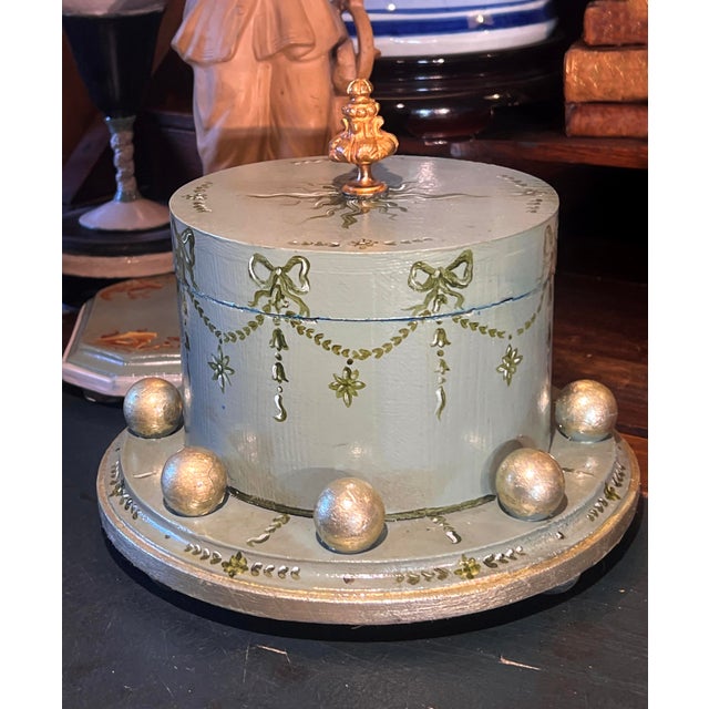 One of a kind hand-painted Regency Neoclassical style circular box on the pedestal with gilded spheres. Jasper green body,...