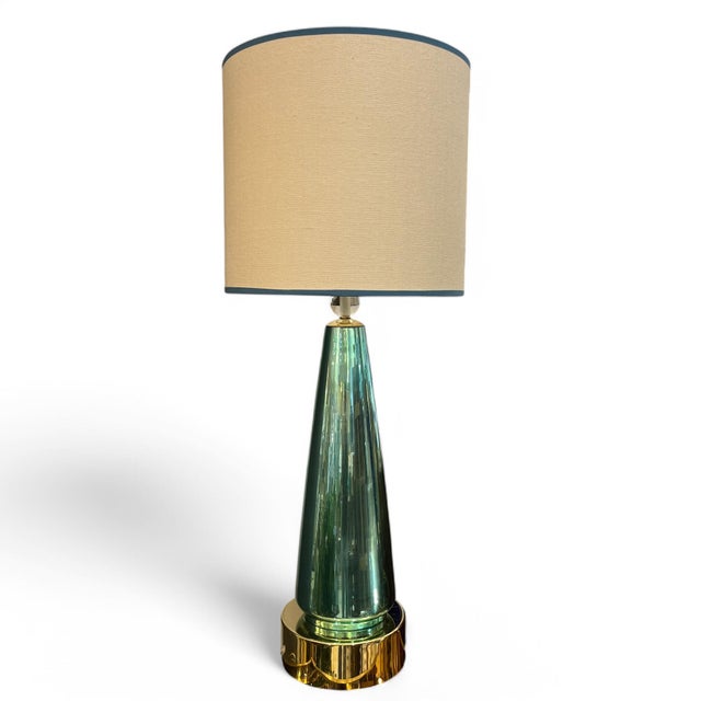 This elegant pair of Murano lamps is a true work of art in lighting. Made from hand-blown glass, they feature a conical...