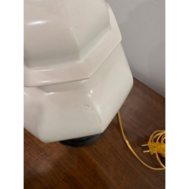 Great mid-to-late 20th century off-white octagonal ceramic lamp with a black wood base. A workhorse of decor! Recently...