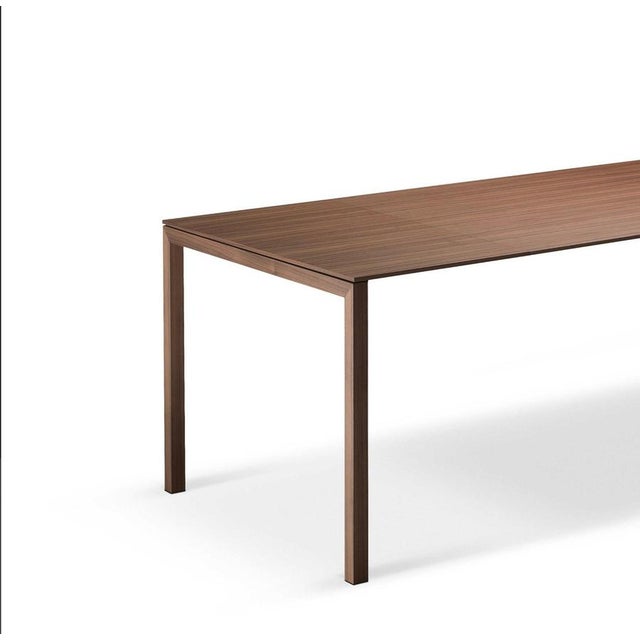 Piero Lissoni Nann Table Fot Cassina Lightness and solidity are the key to decoding this table with minimalist design by...