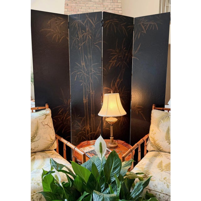 4-Panel Chinoiserie Screen by Baker Furniture This is not a piece that seeks attention—it proceeds with the quiet...