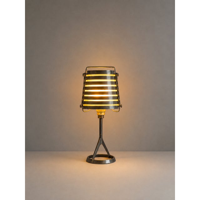 This rare bicolour edition of the cleto table lamp was designed by roberto favaretto for lucente in the 1980s. Unlike the...