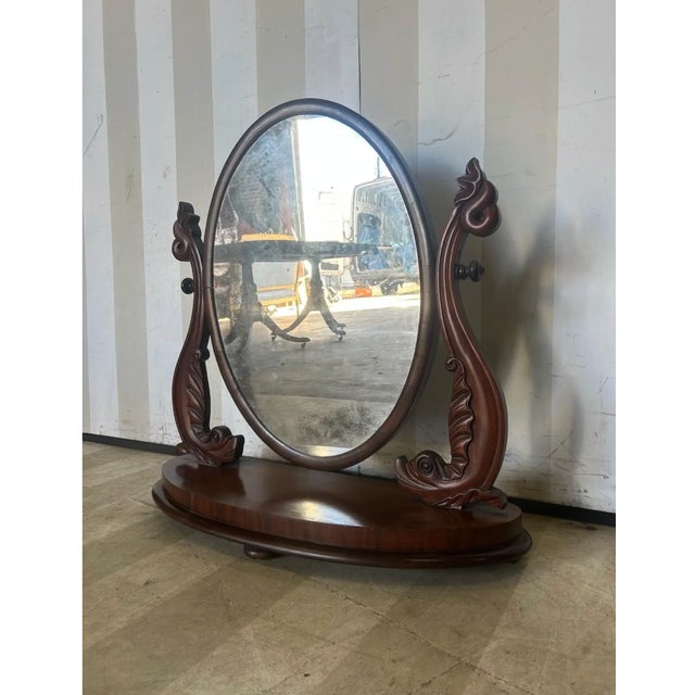 Great little late federal period American dressing mirror with dolphins. Original late glass is adjustable with turning...