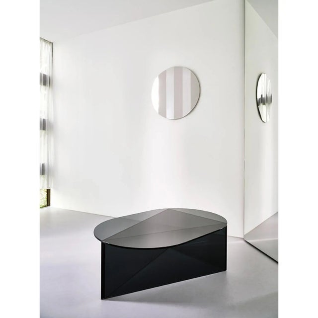 Stripe mirror 90 circle by Sebastian Scherer Dimensions: ø : 90 Materials: Mirror Stainless Steel, Wooden Bracket...