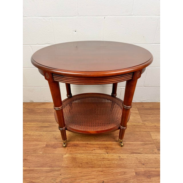 This beautiful Ethan Allen end table is crafted from maple with natural characteristics including wormholes and mineral...