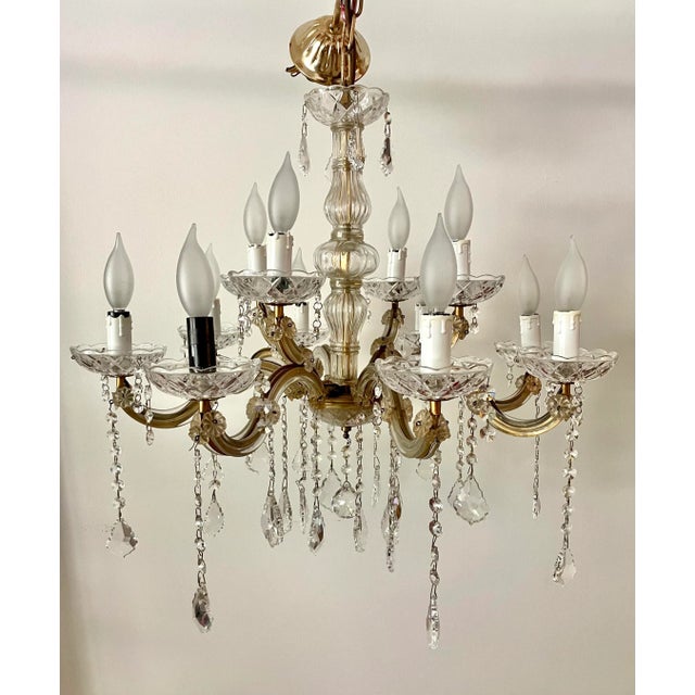 Here is an amazing 12 arm chandelier in the style of Maria Theresa, the mother of Marie Antoinette! She designed the...
