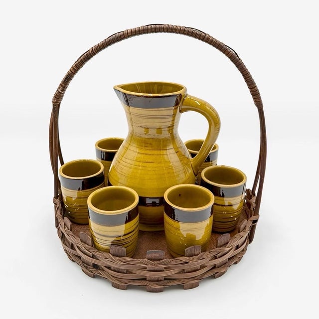 Raw authenticity defines this glazed ceramic tea set, imported directly from Austria. The blend of earthy, honey, and...