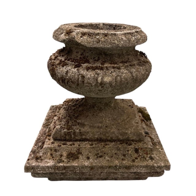 Enhance your garden, patio, or interior decor with this timeless vintage weathered cast stone urn planter. Crafted with a...