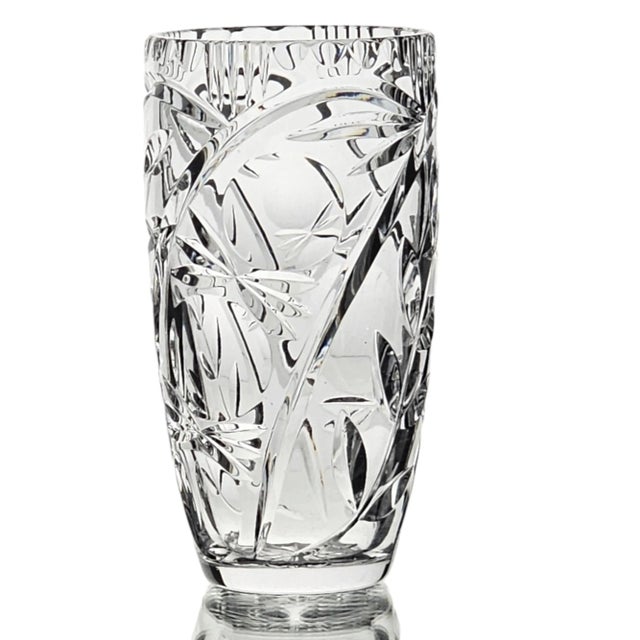 Genuine glass cut crystal vase that sparkles like a diamond. The quality and workmanship of this vase is unmatched. It is...