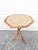 Antique English Tiger bamboo table, c.1880 Having an octagonal top with rattan, below which is a pedestal base made from...