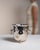 This mid 20th century ice bucket from France is finished in silver, worked in metal. It is worked in a hand-hammered...