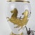 A white & gold vintage Stiffel lamp. It's tall, elegant & depicting a classical chariot driver with 2 rearing horses. It...