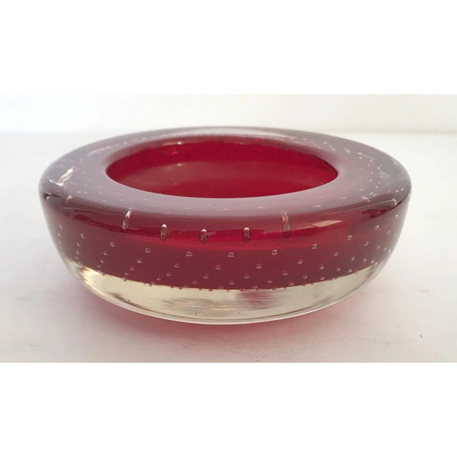 Vintage Italian red Murano glass bowl carefully hand blown with small bubbles inside the glass using pulegoso technique /...