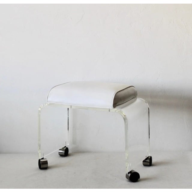 Vintage Mid Century Modern Waterfall Lucite Acrylic Faux Leather Padded Vanity Stool with Castors, no rips or major marks...