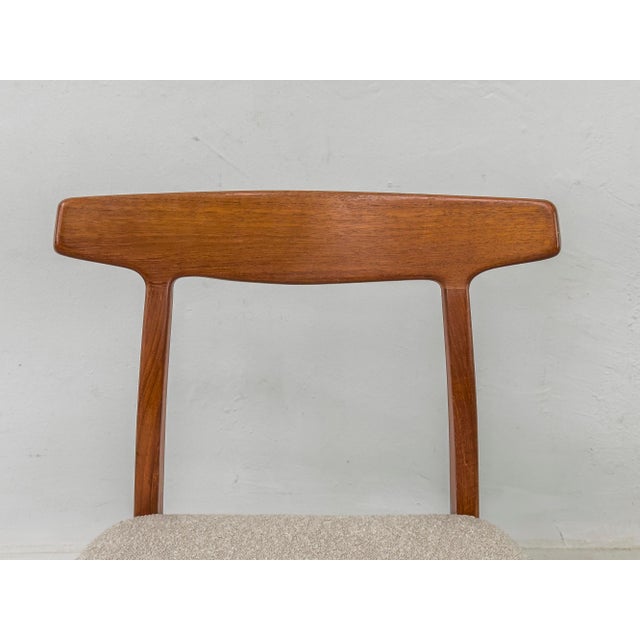 Rare teak chair from Denmark with a newly reupholstered seat in beige/cream bouclé fabric. • Manufacturer: Bruno Hansen •...