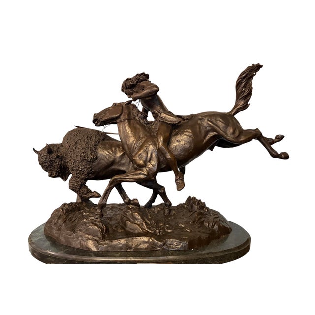 Capture the spirit of the Old West with this striking bronze reproduction of Frederic Remington’s iconic sculpture,...