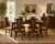 A rare set of six vintage walnut dining chairs, crafted by Broyhill for the iconic Brasilia collection, circa early 1960s....