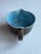 A blue and brown handles cup/gravy boat. Perfect for making small batch eggs, glaze, butter sauce, dressing and gravy....