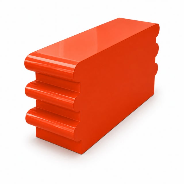 Postmodern Orange Lacquered Bullnose Dresser, featuring six drawers and chic gold accents. This dresser showcases a sleek...