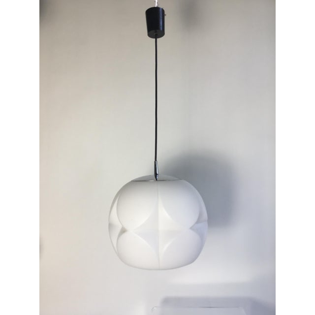 Opal pendant light designed by peill & putzler , germany, 1970s nice light effect. Very good condition. sockets: one x e27...