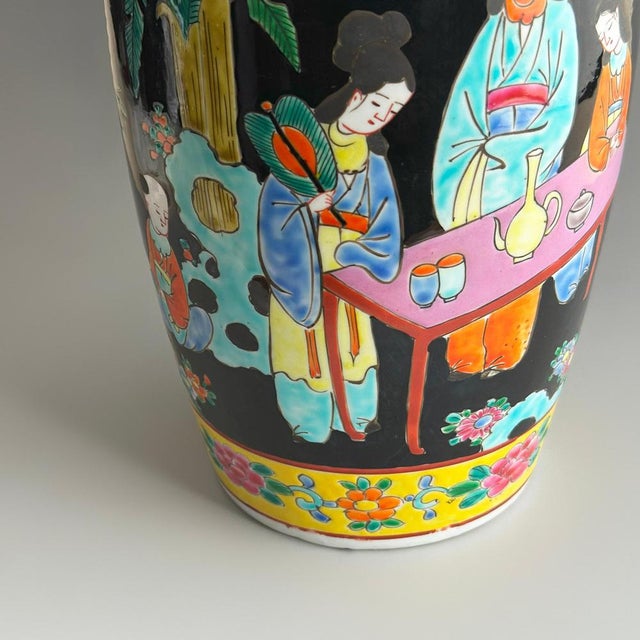A large and vibrant Japanese porcelain vase in the classic rouleau form, crafted in the early 1950s by the Yamatoku kiln...