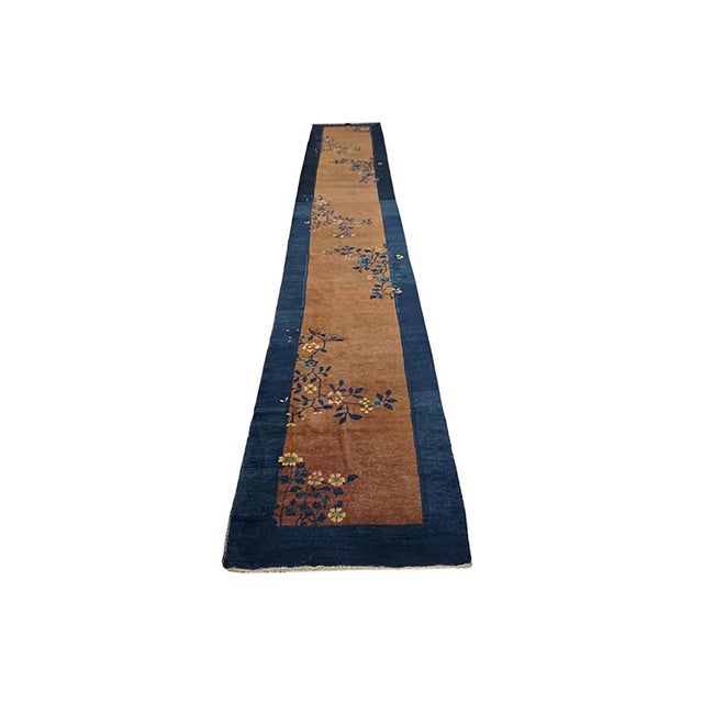 Antique Chinese - Peking Hallway Runner Wool Rug, Country of Origin: China, Circa Date: 1920s. This exquisite piece...