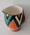 A striking Art Deco hand-painted ceramic jug designed by Enoch Boulton for Crown Devon, distinguished by its bold...