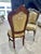 Add timeless elegance to your home with this French Rococo-style vintage chair. Featuring a hand-carved wooden frame, it...