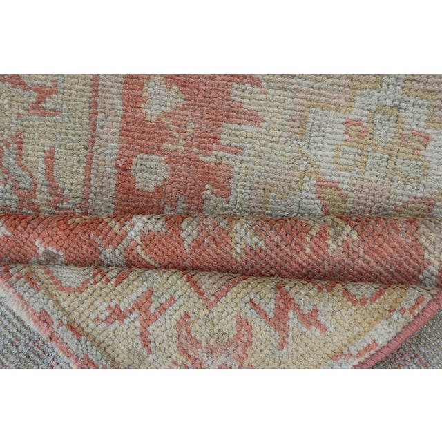 Antique Turkish Oushak Rug With Floral Motifs and Coral Background For Sale - Image 11 of 12
