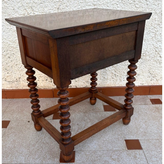 Beautiful Spanish Neo-Baroque side table crafted circa 1950. This Castilian Revival piece features strongly turned...