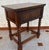 Beautiful Spanish Neo-Baroque side table crafted circa 1950. This Castilian Revival piece features strongly turned...