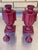 These are a fantastic pair of Maroon colored urns which include the lids. They are in excellent condition and I have owned...