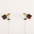A minimalist pair of wall sconces that are reminiscent of Alfa sconces by Svend Aage. Each sconce features a two-part...