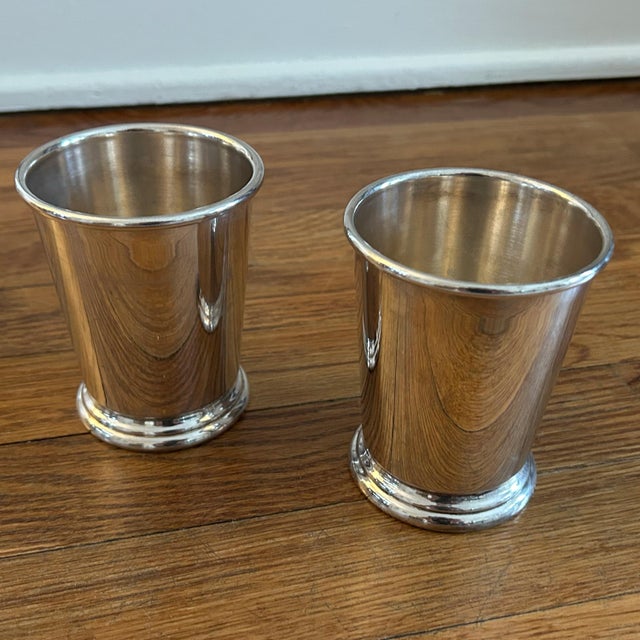 2 vintage marked Sheridan Silverplate mint julep cups. These classic cups feature a classic design with a pedestal base...