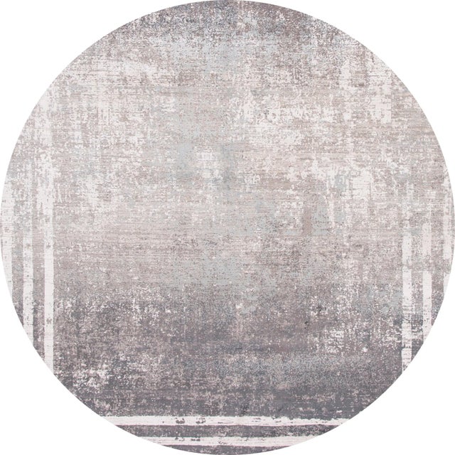 Beautiful contemporary high-end rug, machine-made with a gray field, and white accents in an allover design. This rug...