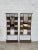 Pair of entrance checkrooms in rattan and black metal Each features 6 coat hooks, a hat rack, an umbrella stand and a...