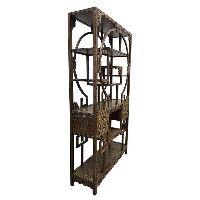 This item is a traditional Chinese Bo Gu Jia (博古架), also known as a Chinese curio display shelf or multi-treasure cabinet....